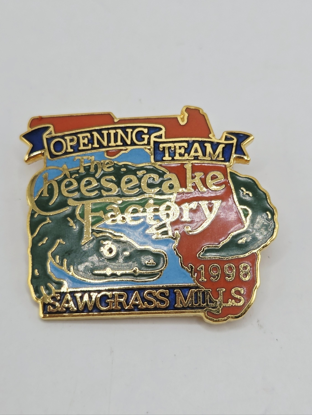 THE CHEESECAKE FACTORY OPENING TEAM PIN SAW GRASS MILLS 1998 FLORIDA